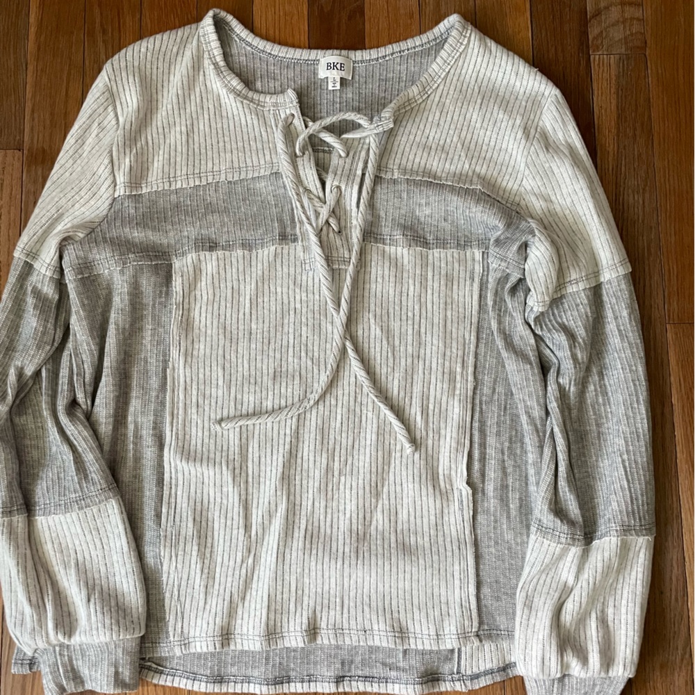 Buckle sweater blouse